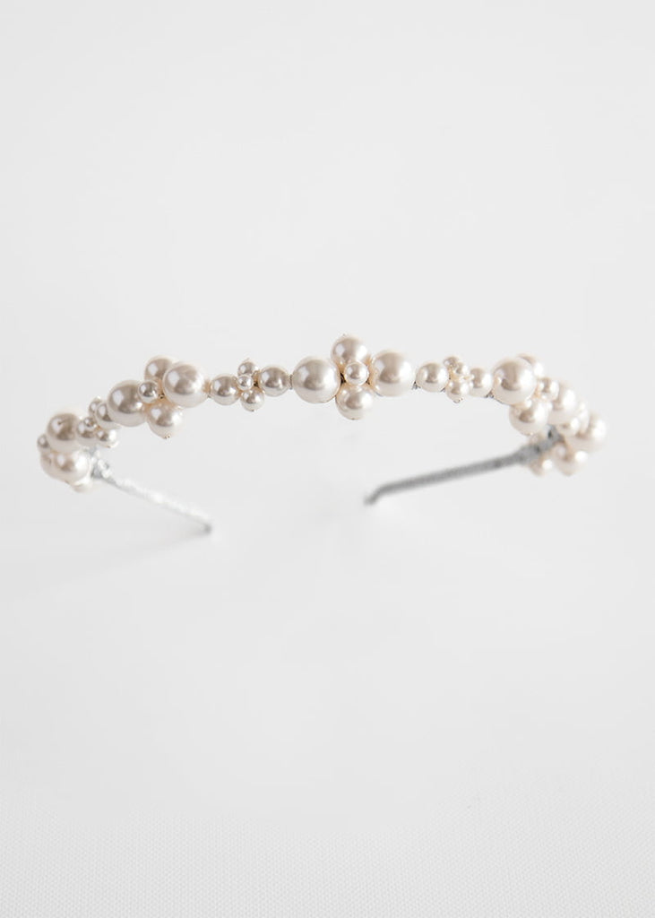 Cluster of pearls to form a nice shape along the length of the headband.