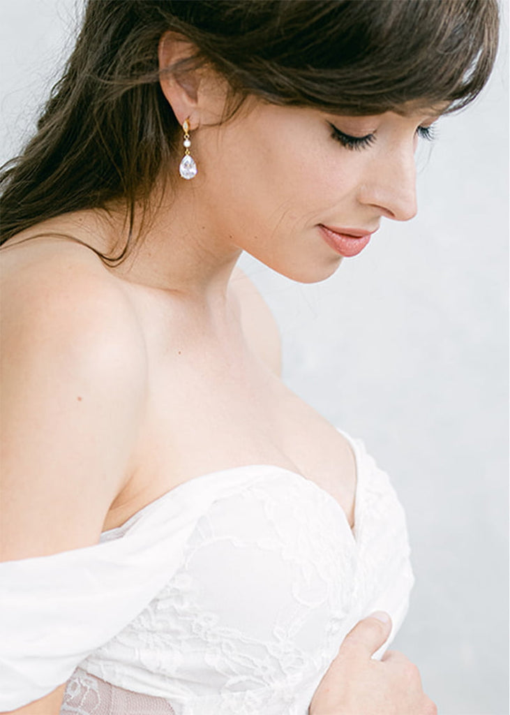 CZ studs with a tear drop shape cubic zirconia drop.