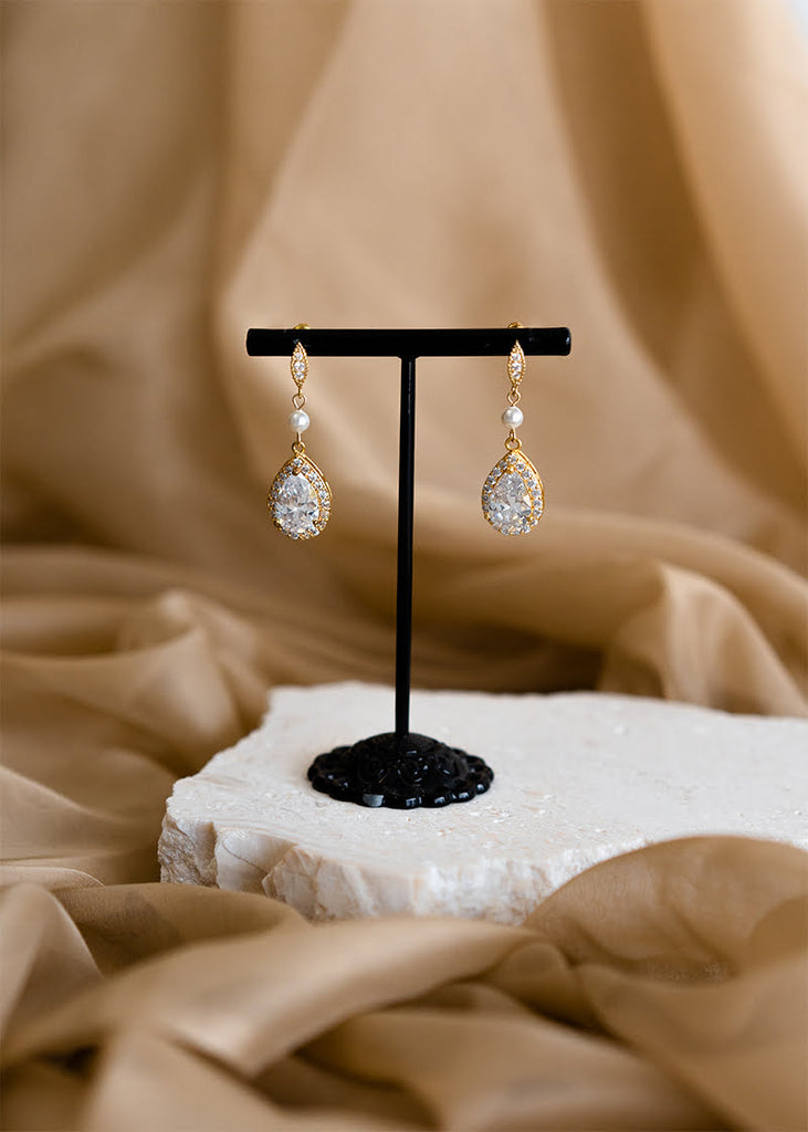 CZ studs with a tear drop shape cubic zirconia drop.