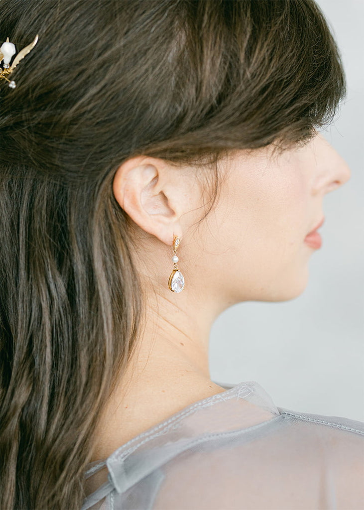 CZ studs with a tear drop shape cubic zirconia drop.