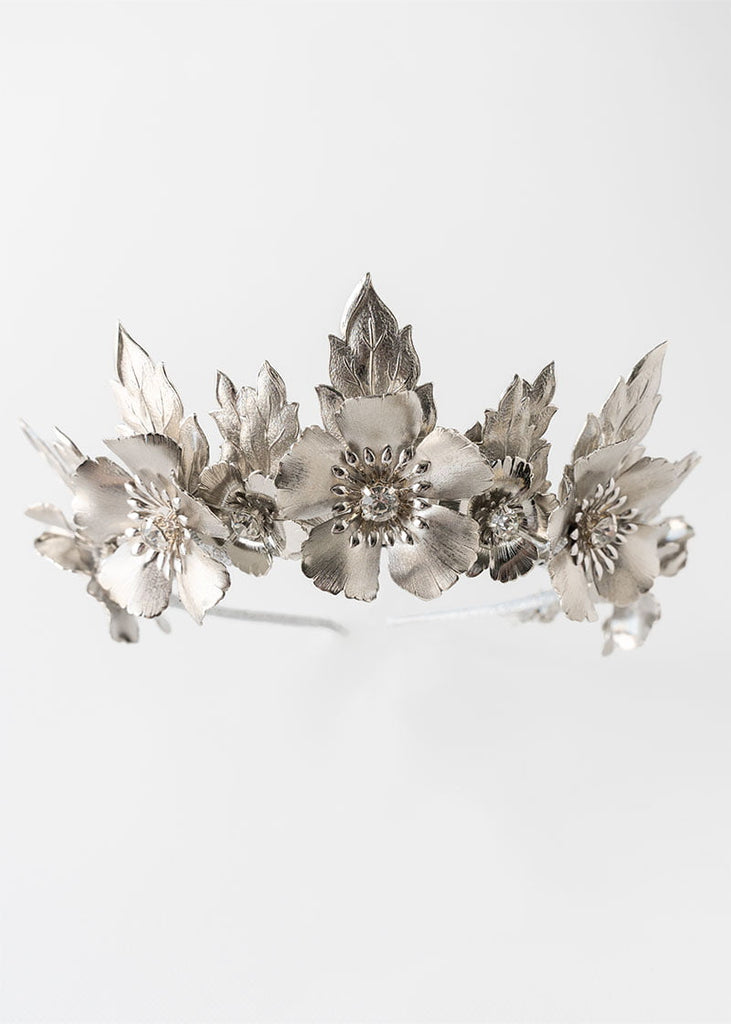 Catarina headpiece is a statement metal flower crown with large leaves and large metal flowers
