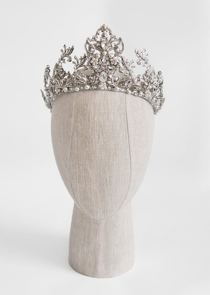 Kristina silver crown is 8.5cm tall and is hand beaded with lots of small pearls and rhinestones.