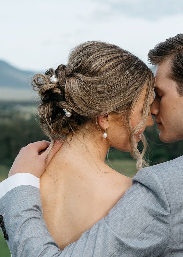 3 pearl pins. Each pin has a cluster of 4 pearls in different sizes and amount of pearls.