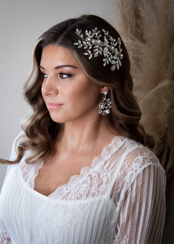 A rhinestone modern headpiece with leaves and pearls