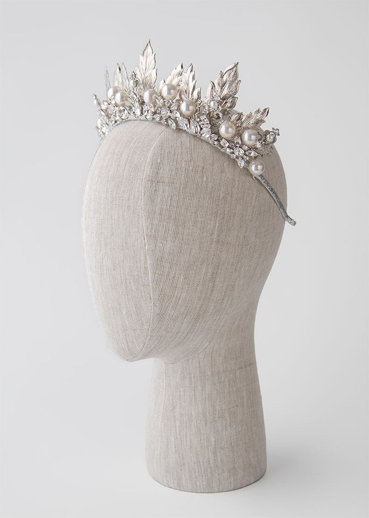 Stella wedding headpiece is a modern pearl and rhinestone design